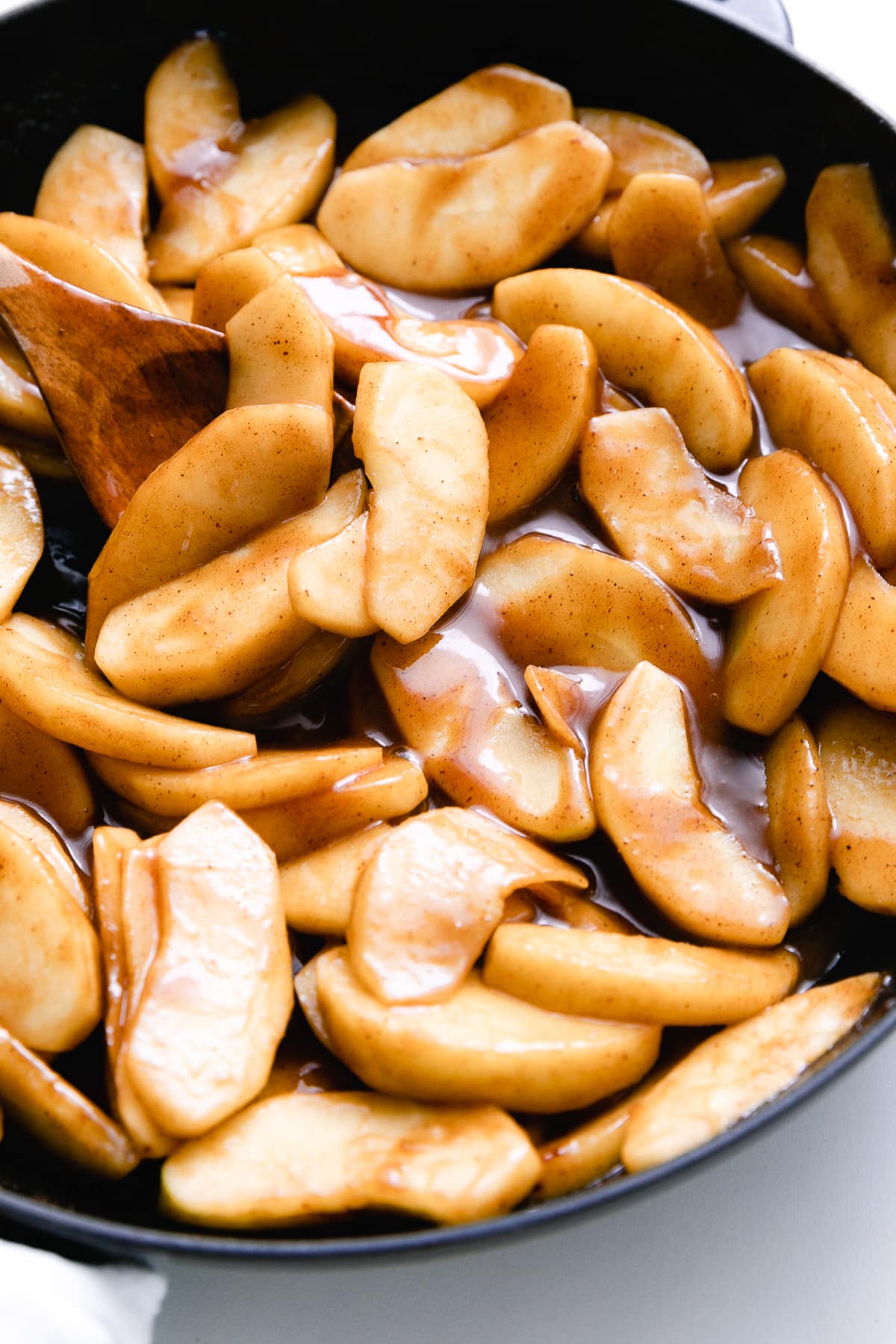 side angle view of skillet cinnamon apples.