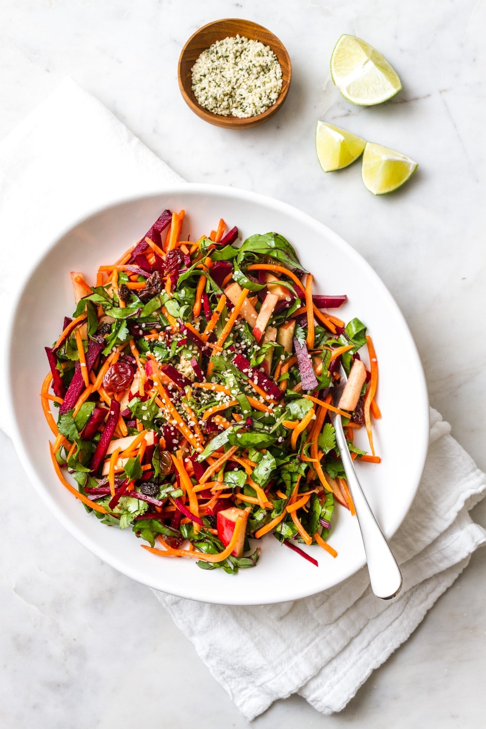 top down view of white with healthy detox salad.