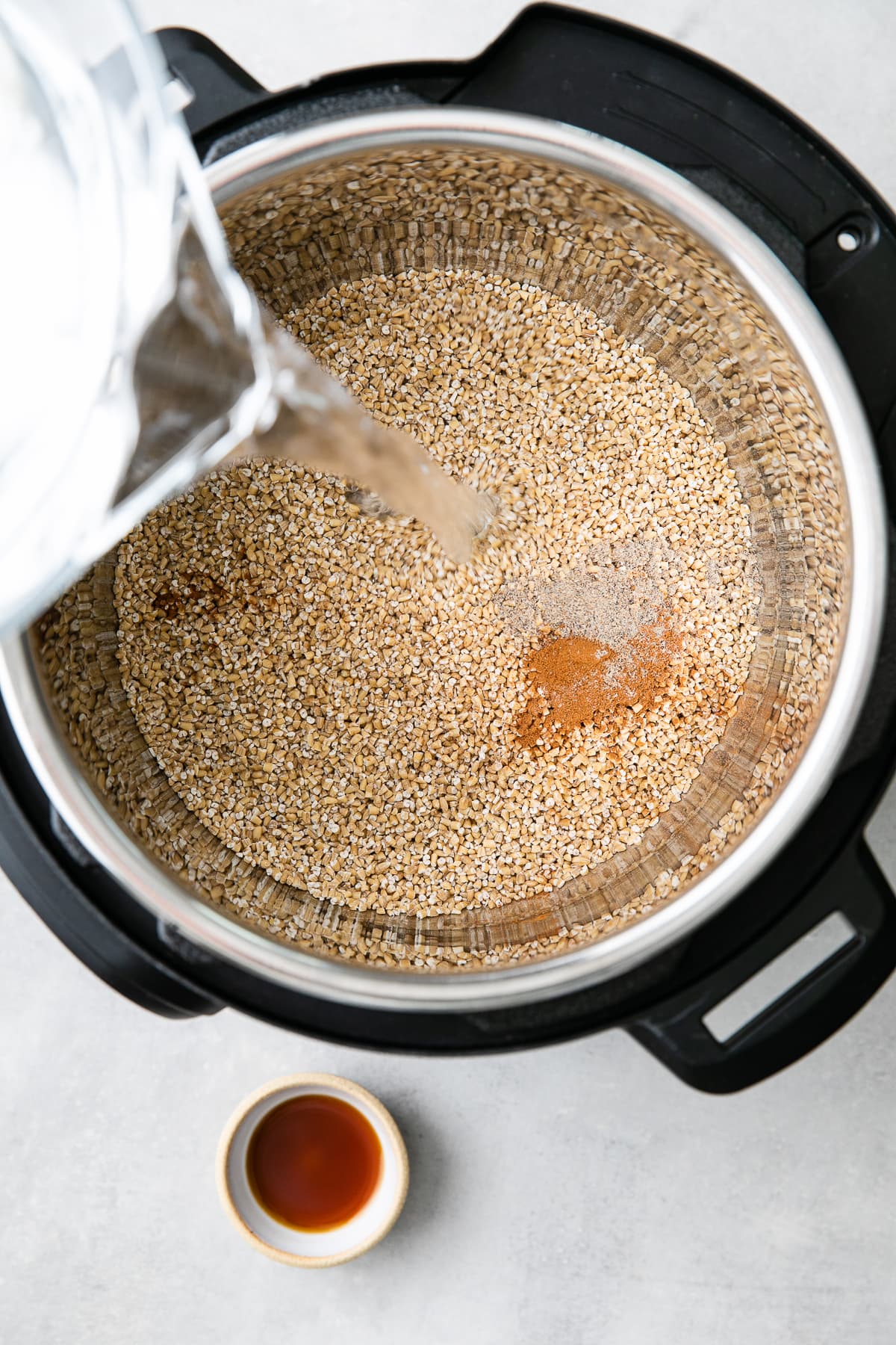 top down view showing process of making Instant Pot steel cut oats.