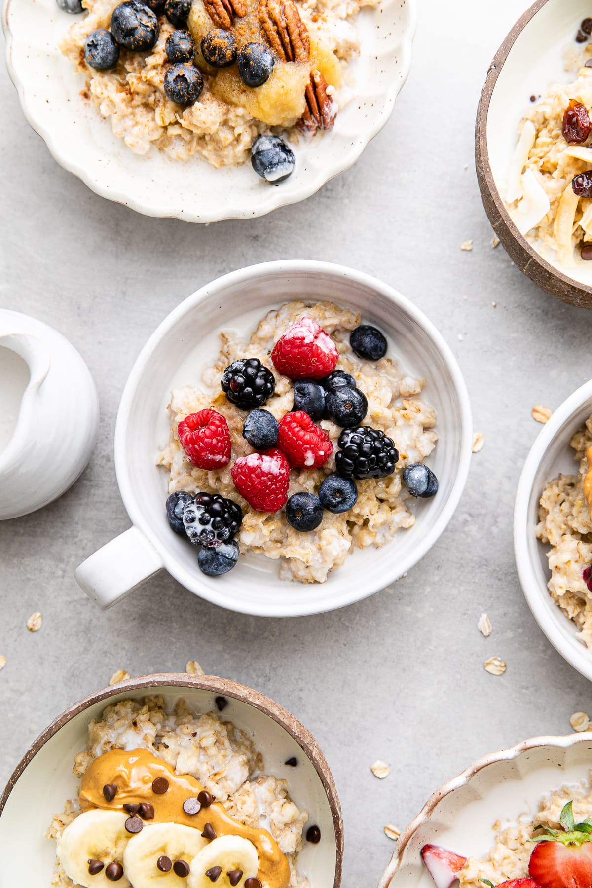 top down view of the best healthy oatmeal with berries and coconut cream.