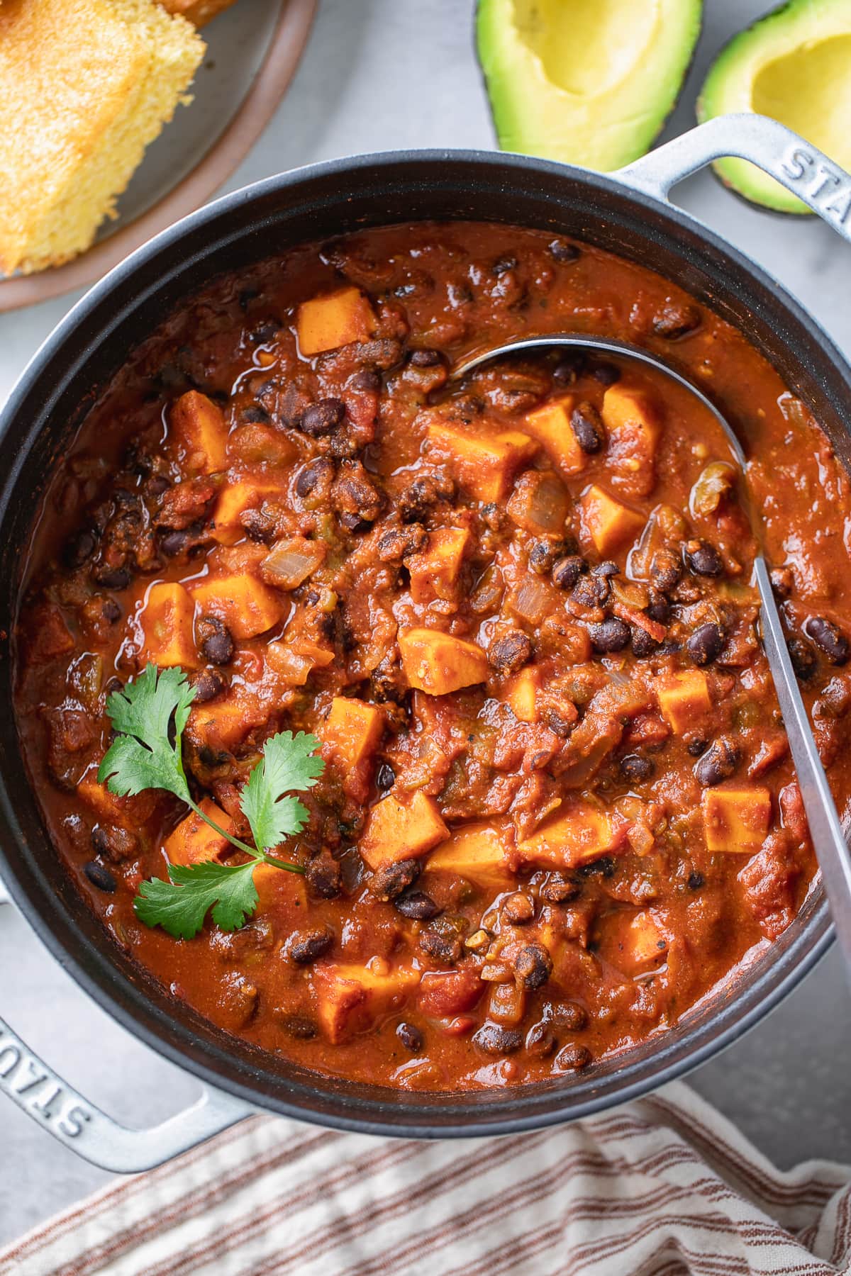 top down view of freshly made pot of vegan sweet potato black bean chili.