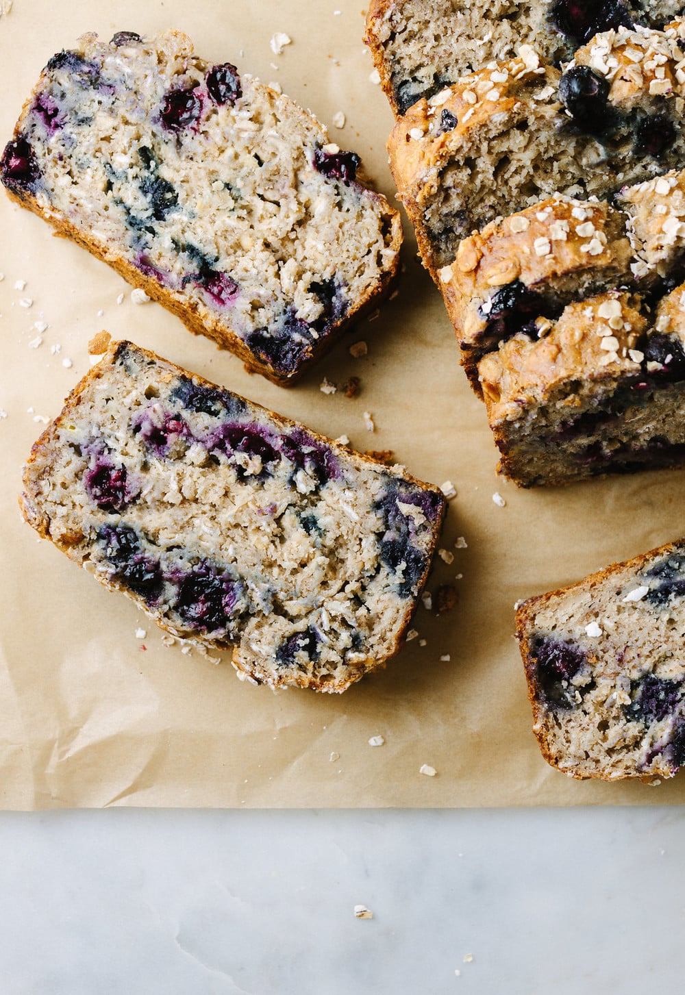 top down view of vegan blueberry banana oat bread sliced