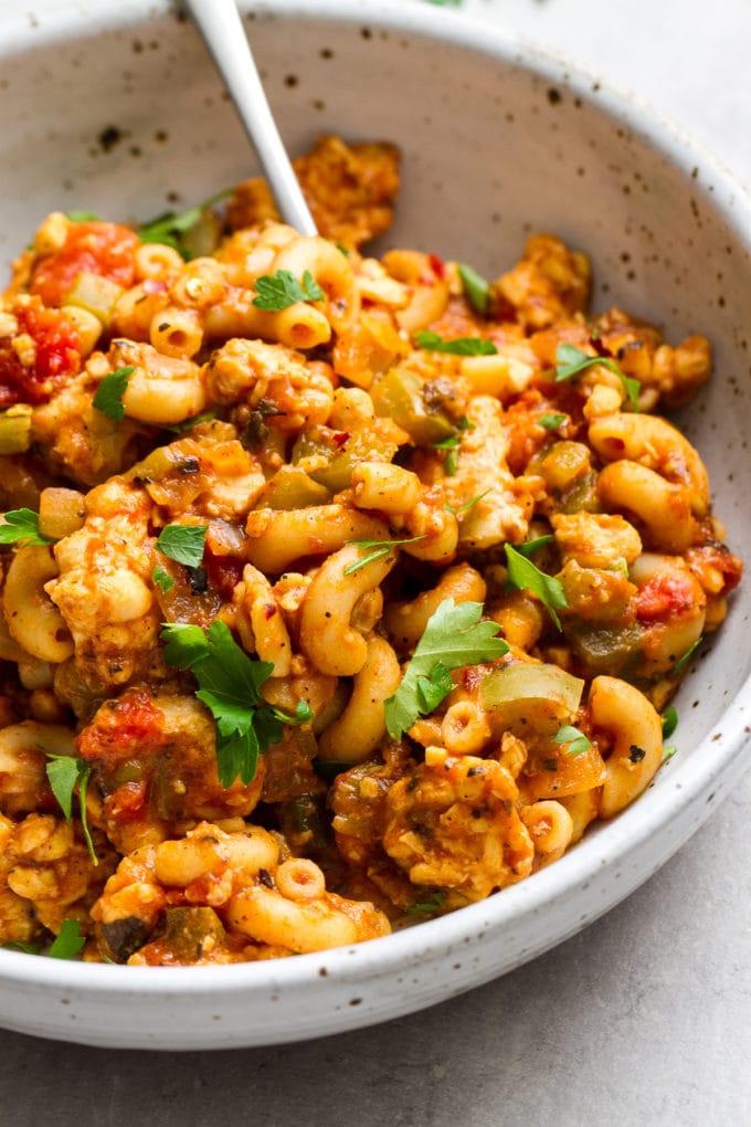 side angle view of American style vegan goulash in a serving bowl.