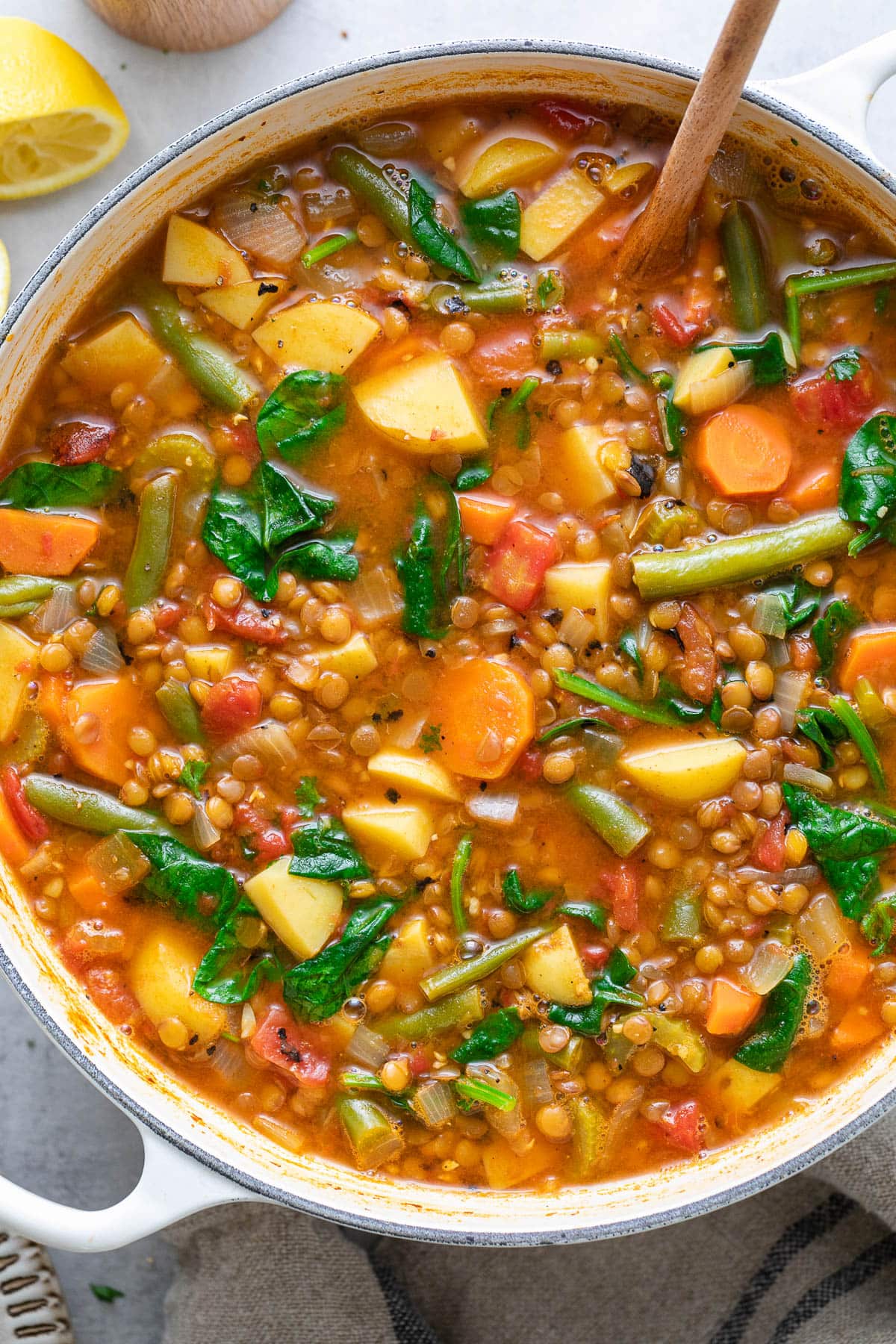 top down view of pot with fresh cooked vegan lentil soup.