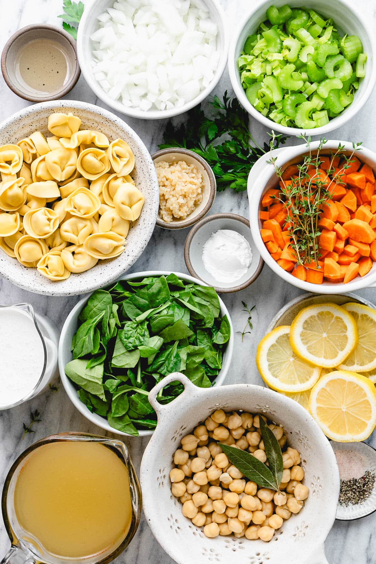 top down view of all the ingredients used to make vegan tortellini soup.